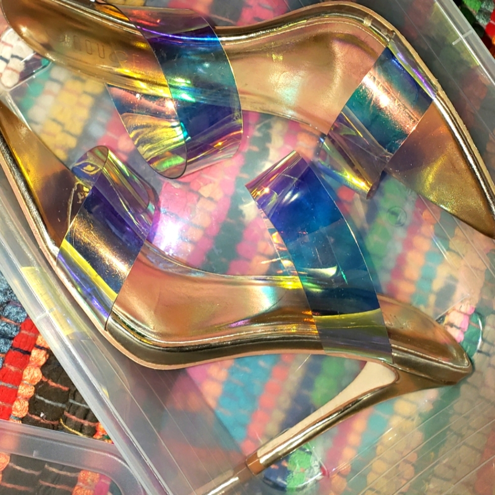 Translucent high heeled vinyl mules